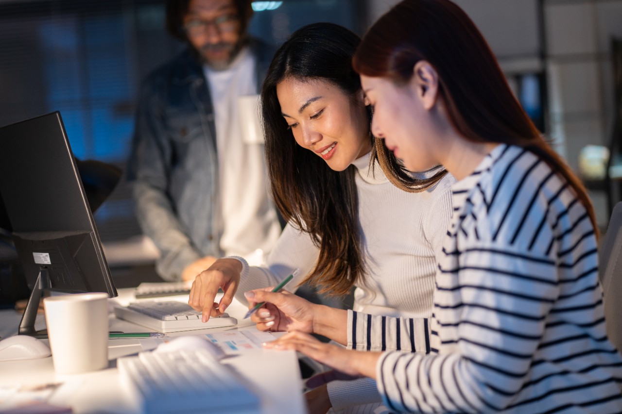Two business women working together on a project